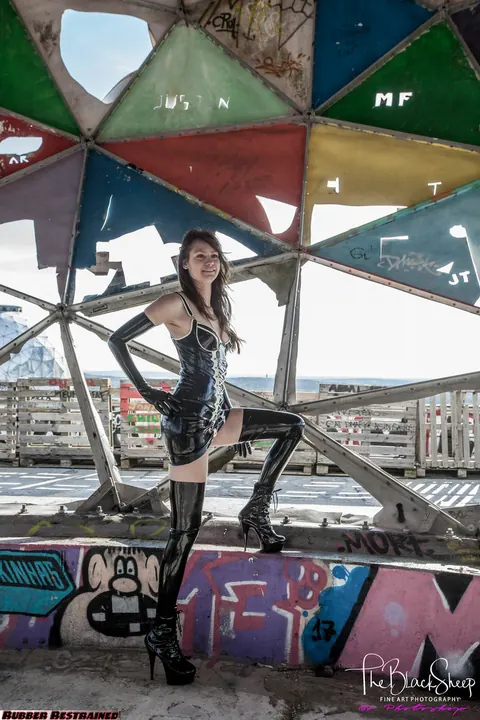 Woman Poses in Latex and Stockings at Abandoned Park – photo 6 of 16