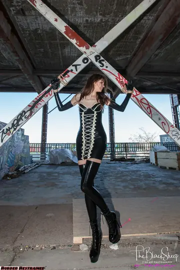 Woman Poses in Latex and Stockings at Abandoned Park