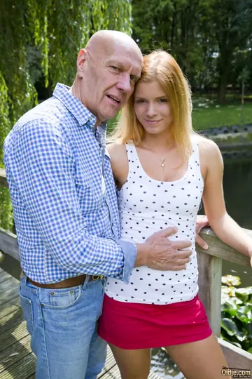 Redhead Gives a Deepthroat Blowjob to Old Man Outdoors