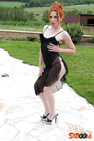 European Redhead Poses Outdoors in Lingerie and Heels