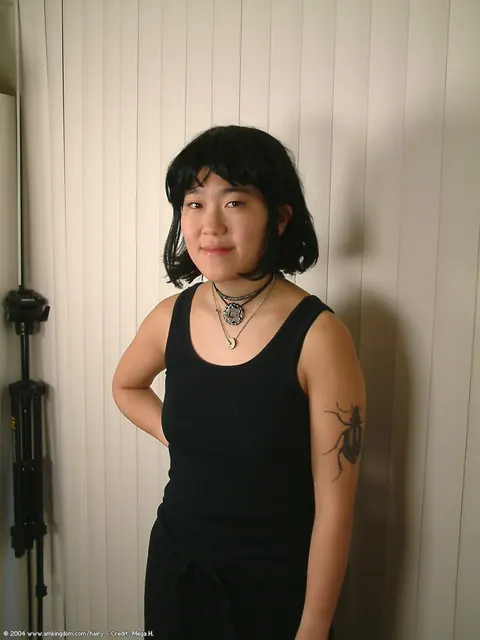 Slim Mature Asian Woman Pulls Down Her Shorts and Spreads Her Hairy Pussy – photo 1 of 16