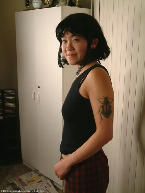 Slim Mature Asian Woman Pulls Down Her Shorts and Spreads Her Hairy Pussy – photo 3 of 16