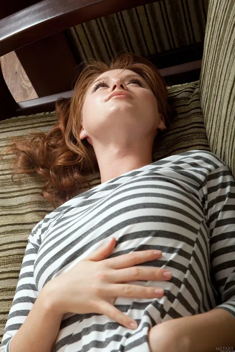 Nomi A: Redhead Bares Her Hairy Pussy on the Sofa – photo 5 of 20