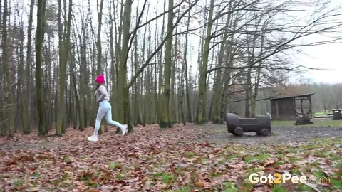 European Woman Pisses in Jeans and Glasses Outdoors – photo 15 of 15
