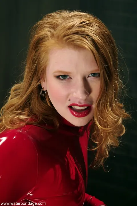 Petite Redhead MILF Poses in a Red Latex Dress and Heels – photo 5 of 9