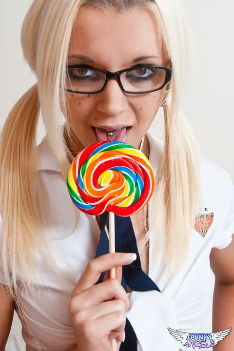 Stacey Rocks: British Blonde in Uniform Plays with a Dildo on the Bed – photo 4 of 12