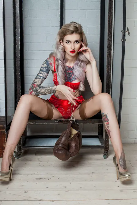 Tattooed Redhead Poses in Lingerie and a Skirt – photo 11 of 13