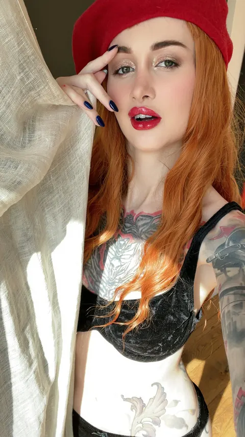 Tattooed Redhead Poses in Lingerie and a Skirt – photo 9 of 13