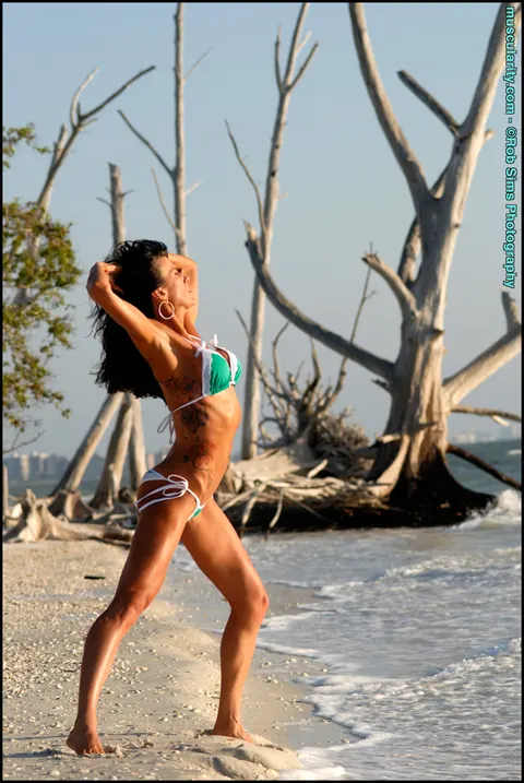 Muscular MILF with Big Tits Strips Off Her Bikini Top on the Beach – photo 7 of 15
