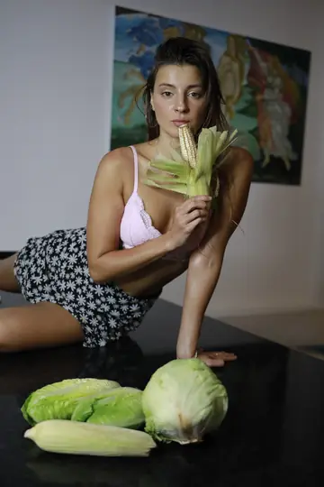 Skinny Brunette with Small Natural Tits and Tattoo Strips and Poses Nude