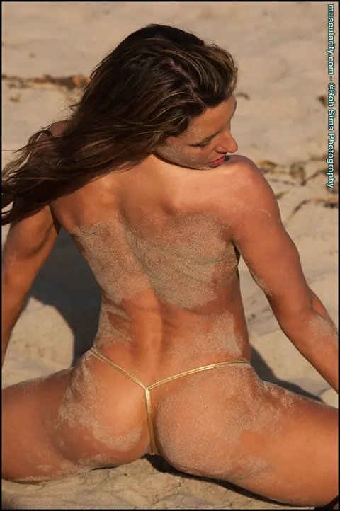 Busty Athletic MILF Strips Out of Her Bikini on the Beach – photo 4 of 15