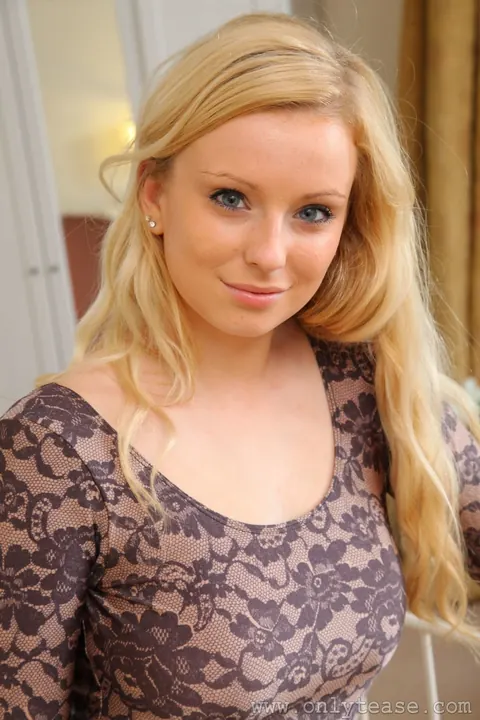 Hollie Sparrow: Busty Blonde in Stockings and Heels Displays Her Curves – photo 14 of 21