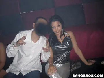 Thick Latina in a Skirt and Panties Kisses Her Man at a Nightclub