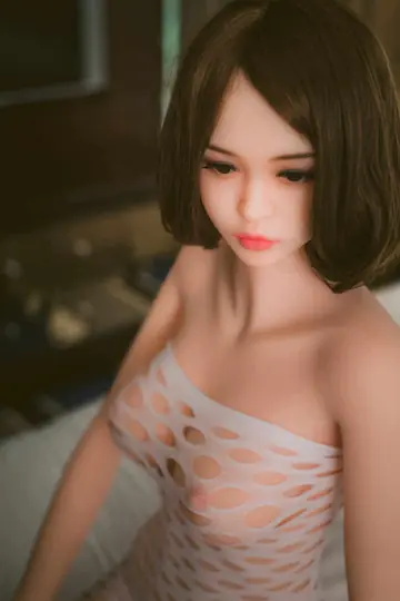 Petite Slim Woman Strips Out of Her Dress and Poses Nude