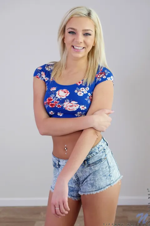 Tiffany Watson: Slim Blonde Pulls Panties Aside and Masturbates with a Dildo – photo 1 of 21