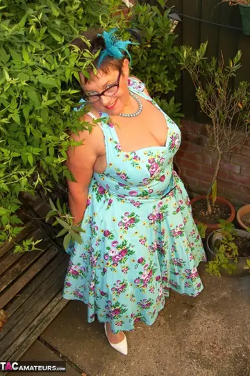 Mature BBW Shows Her Big Tits in Stockings on the Backyard Patio