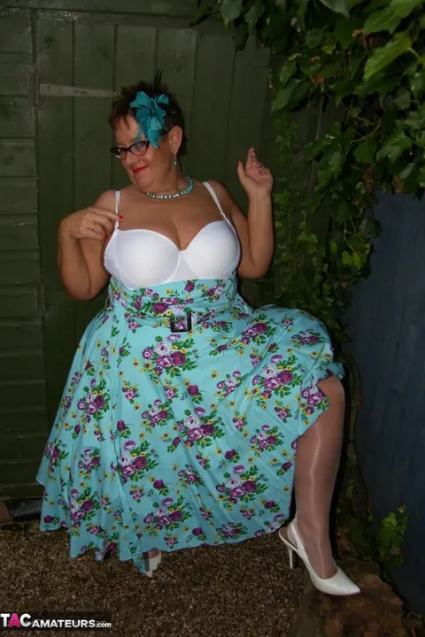 Mature BBW Shows Her Big Tits in Stockings on the Backyard Patio – photo 7 of 20