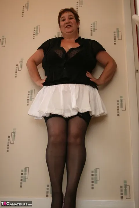 Kinky Carol: Mature British BBW in Stockings Lifts Her Skirt – photo 3 of 16