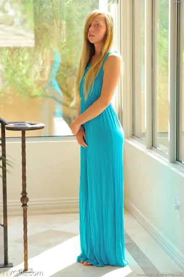Blonde Strips Nude and Shows Her Ass and Pussy