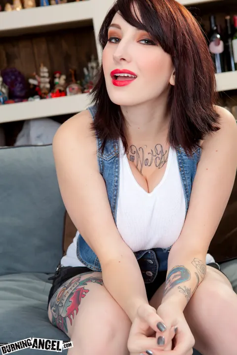 Shay Ryan: Busty Brunette in Boots Spreads Her Shaved Pussy on the Sofa – photo 2 of 17