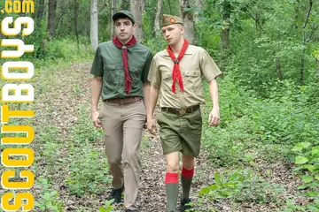 Blonde Stud Takes Bareback Anal from Older Colleague in the Woods