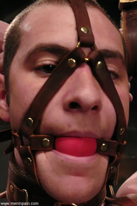 Woman in Latex and Leather Dominates Bound Man with Blowjob – photo 3 of 17