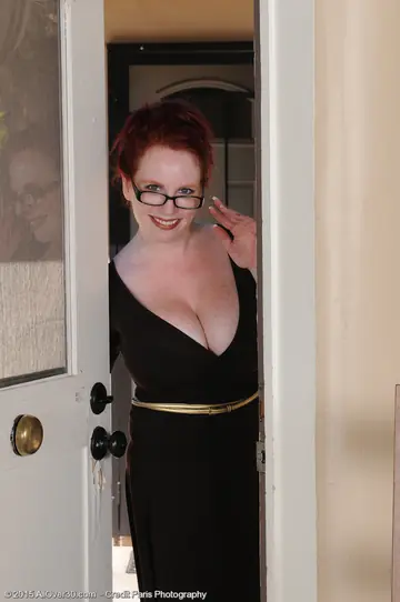 Red Vixen – Pale Mature Redhead Removes Glasses and Lingerie to Spread Her Pussy