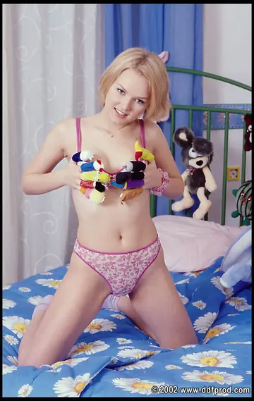 Skinny Blonde in Lingerie and Socks Spreads Her Legs
