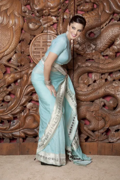 Sunny Leone: Asian Brunette MILF Strips Out of Her Dress and Spreads – photo 4 of 16