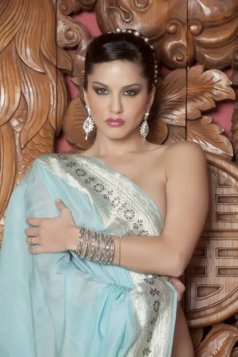 Sunny Leone: Asian Brunette MILF Strips Out of Her Dress and Spreads – photo 10 of 16