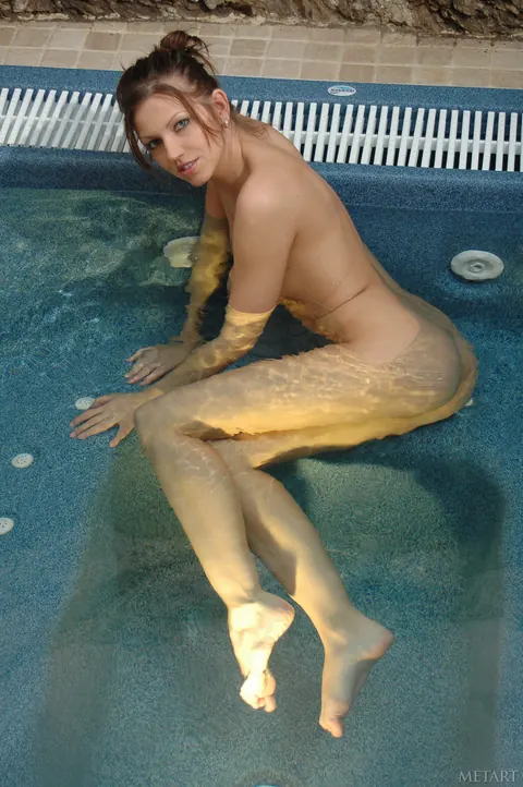 Busty Woman Spreads Her Shaved Pussy in the Pool – photo 2 of 20