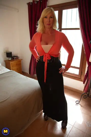 Busty European MILF Peels Off Her Skirt and Pantyhose to Finger Herself