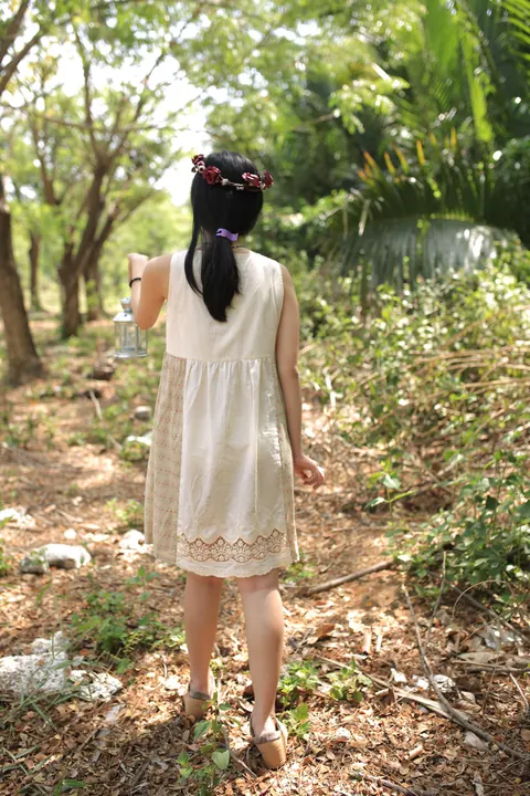 Petite Asian Woman Poses in a White Dress Outdoors – photo 8 of 21