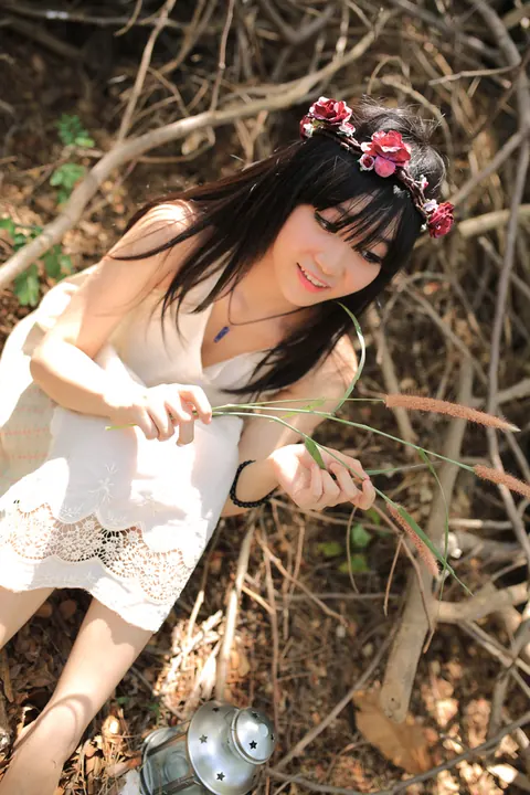 Petite Asian Woman Poses in a White Dress Outdoors – photo 21 of 21