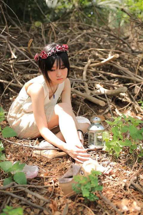 Petite Asian Woman Poses in a White Dress Outdoors – photo 5 of 21