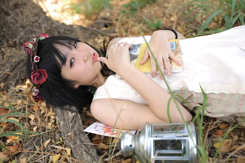 Petite Asian Woman Poses in a White Dress Outdoors – photo 19 of 21