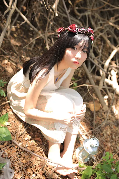 Petite Asian Woman Poses in a White Dress Outdoors – photo 4 of 21