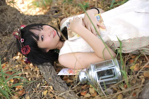 Petite Asian Woman Poses in a White Dress Outdoors – photo 20 of 21