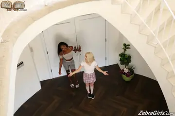 Ebony Lesbians Kiss, Eat Pussy and Fuck with a Strap-On in the Bedroom