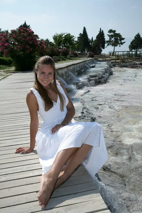 Brunette Flashes Her Pussy in a Long Dress on the Beach – photo 4 of 21