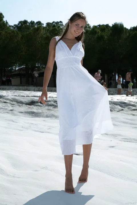 Brunette Flashes Her Pussy in a Long Dress on the Beach – photo 2 of 21