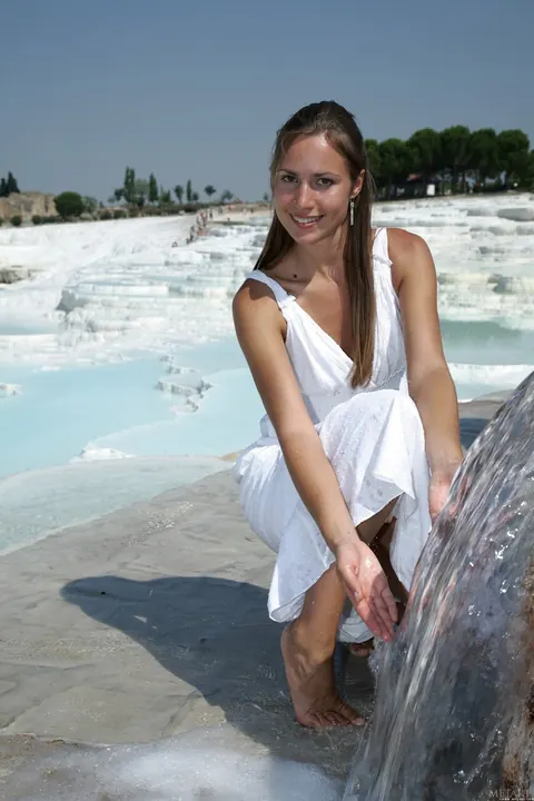 Brunette Flashes Her Pussy in a Long Dress on the Beach – photo 15 of 21