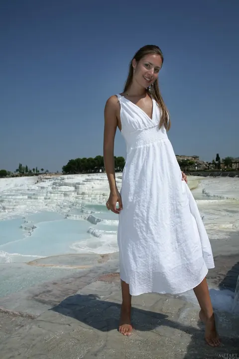 Brunette Flashes Her Pussy in a Long Dress on the Beach – photo 14 of 21
