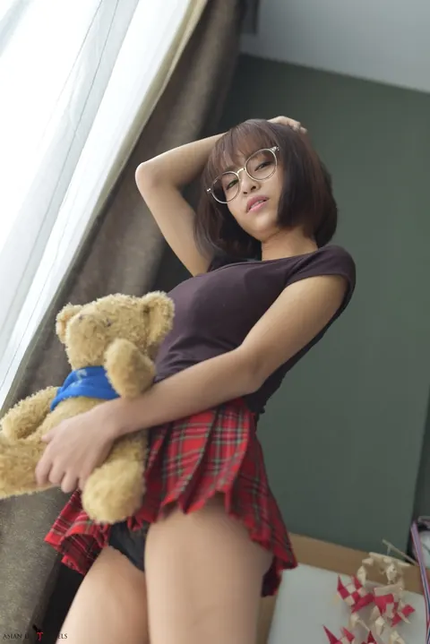 Eimi Fukada: Petite Asian Brunette Teases in a Miniskirt and Panties – photo 6 of 20