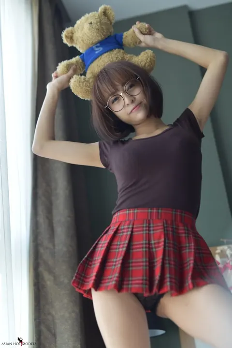 Eimi Fukada: Petite Asian Brunette Teases in a Miniskirt and Panties – photo 10 of 20