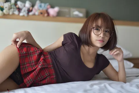 Eimi Fukada: Petite Asian Brunette Teases in a Miniskirt and Panties – photo 3 of 20