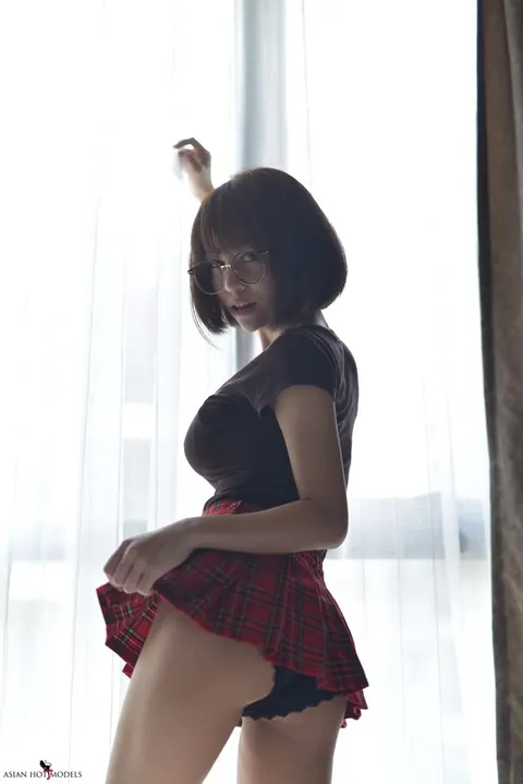 Eimi Fukada: Petite Asian Brunette Teases in a Miniskirt and Panties – photo 17 of 20