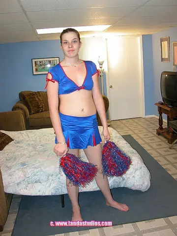 Amateur in Uniform Undresses, Fingers, and Toys Her Pussy