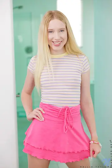 Slim Blonde Lifts Her Skirt and Spreads Her Trimmed Pussy