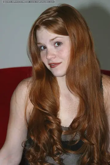 Pale Redhead in Lingerie Pulls Panties Aside and Spreads Her Pink Pussy